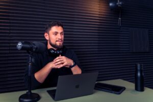 Podcast host waiting for answer