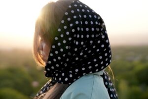 close view of a beautiful girl's face with scarf