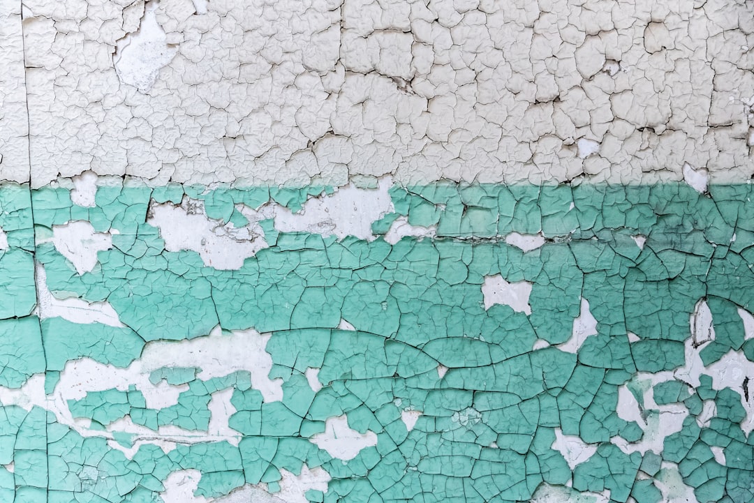 Peeling paint on a wall at an abandoned prison